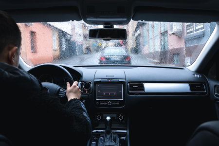 Hands on the wheel when driving at high speed from inside the car.の写真素材