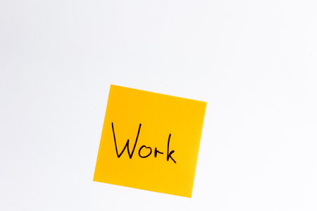 Paper reminder with word Work on a white background, flat lay.の写真素材