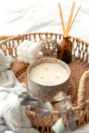 Spa composition with aroma oil diffuser lamp and candle on a blurred background.の写真素材