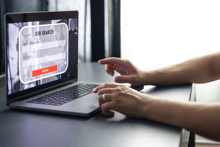 Man working on laptop and Information for the searching job, employment concept.の写真素材