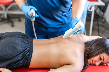 Extracorporeal shockwave therapy, physical therapy for neck and back muscles.