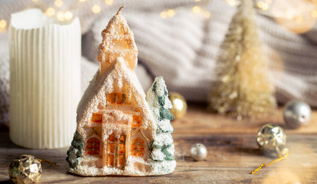 Christmas background with decorative house and holiday decor details.の写真素材