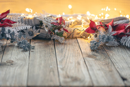 Cozy Christmas background with decorative details on a wooden surface.の写真素材