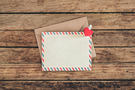 Blank postcard on wooden background, top view, copy space.の写真素材
