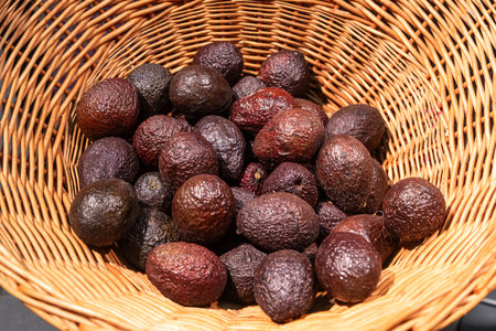 Basket with avocado in a supermarket, close up.の写真素材