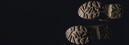 Bottom of shoes, isolated on black background.