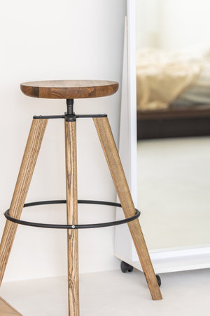 Stylish wooden chair in the interior of the room. Interior and style concept.の写真素材