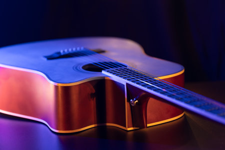 Close up of guitar and strings with shallow depth of field, soft focus.の写真素材