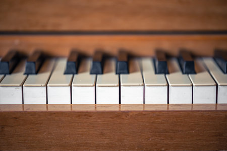 Close-up, keys of an antique wooden piano.の写真素材