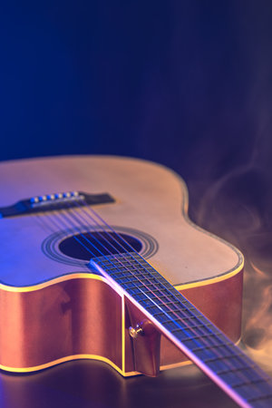 Close up of guitar and strings with shallow depth of field, soft focus.の写真素材