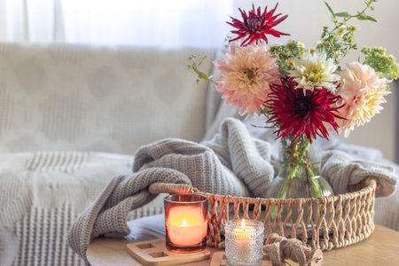Cozy home interior with flowers dahlias. Autumn home comfort.の写真素材