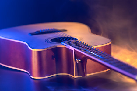 Close up of guitar and strings with shallow depth of field, soft focus.の写真素材