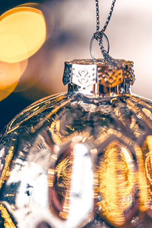 Macro shot of a silver Christmas ball on a blurred background.の写真素材