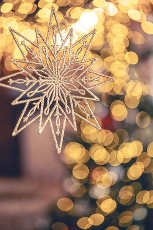 Christmas background with decorative star with bokeh lights.の写真素材