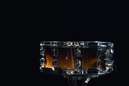 Drum close-up. Drum on a black background. Copy space.の写真素材