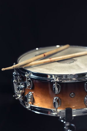 Drum close-up. Drumsticks with a drum.