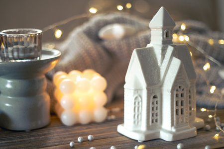 Cozy Christmas composition with candles and a light garland. Christmas concept.の写真素材