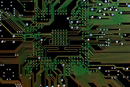 Background with a printed circuit board. The concept of modern technologies.の写真素材