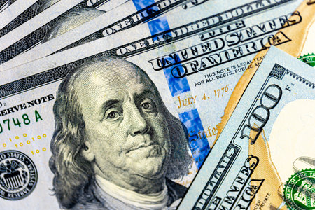 Close-up image of Benjamin Franklin on 100 bill. Finance concept.