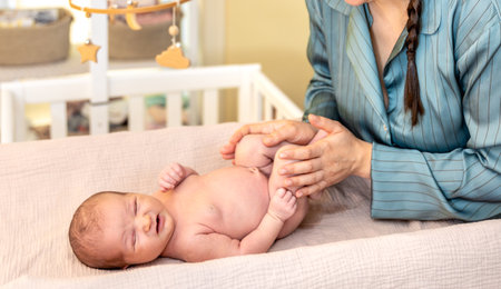 A young mother with a newborn baby. Newborn baby.の写真素材