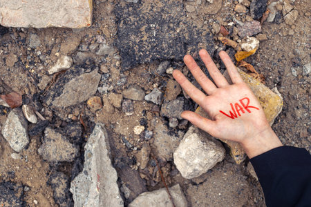 Slogan of peace without war is written on the woman's hand in red.の写真素材