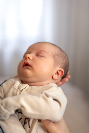Newborn baby in arms. Newborn baby. Baby close-up.の写真素材
