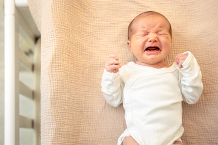 Newborn baby. Newborn baby girl crying.の写真素材