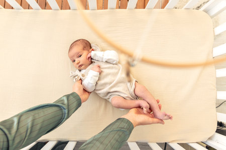 Newborn baby in bed. Childhood concept.の写真素材