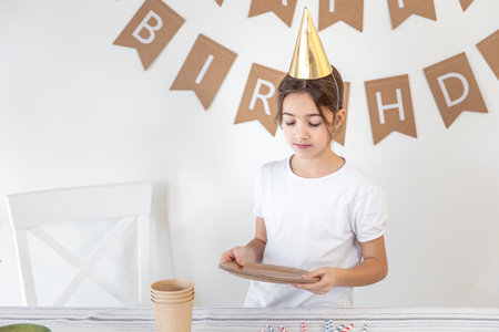 Birthday concept. Girl preparing for birthday.の写真素材