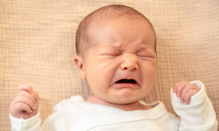 Newborn baby. Newborn baby girl crying.の写真素材