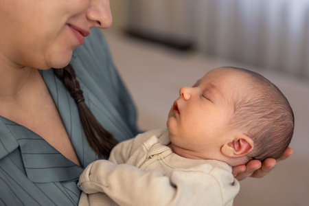 A young mother with a newborn baby. Newborn baby.の写真素材