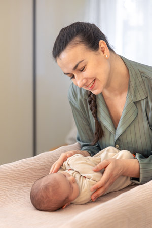 A young mother with a newborn baby. Newborn baby.の写真素材