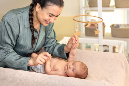 A young mother with a newborn baby. Newborn baby.の写真素材