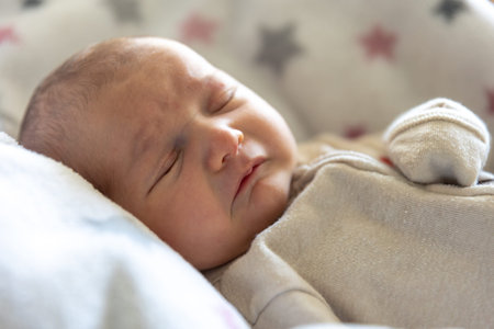 Newborn baby. Newborn baby girl crying.