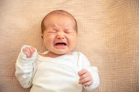 Newborn baby. Newborn baby girl crying.の写真素材