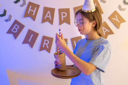 Birthday concept. Preparation for the birthday. Festive paper cups.の写真素材