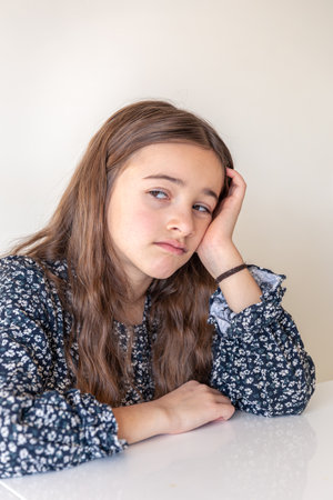 Sad girl. The girl has a sad emotion. Thoughtful girl.の写真素材