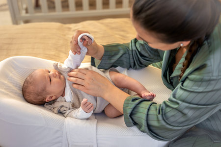 A young mother with a newborn baby. Newborn baby.の写真素材