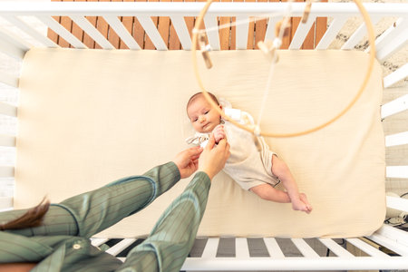 Newborn baby in bed. Childhood concept.の写真素材