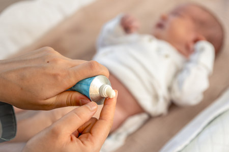 Caring for a newborn baby. Hygiene of a newborn baby.の写真素材
