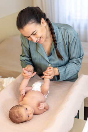 A young mother with a newborn baby. Newborn baby.の写真素材