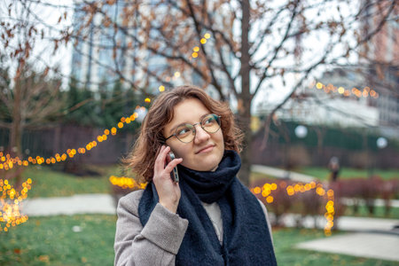 Young woman talking on the phone.の写真素材