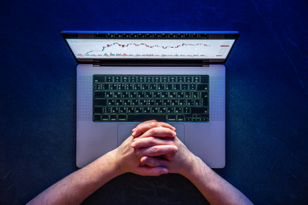 Hands on laptop. Trading. Crypto investment. Hands and laptop. Stock market.の写真素材
