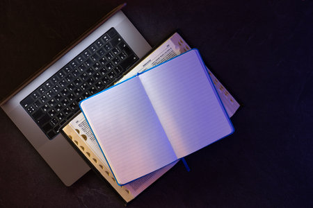 Bible and laptop. Online Bible study concept. Blank notebook with Bible and laptop.の写真素材