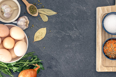 Cooking ingredients background. Food background with spices, herbs and vegetables.の写真素材
