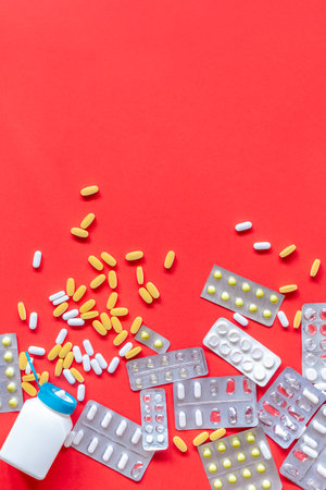 Medicine and pharmacy concept. Scattered pills. Top view with copy space.の写真素材