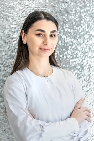Portrait of a young female dentist. Dentistry concept. Dental treatment.の写真素材