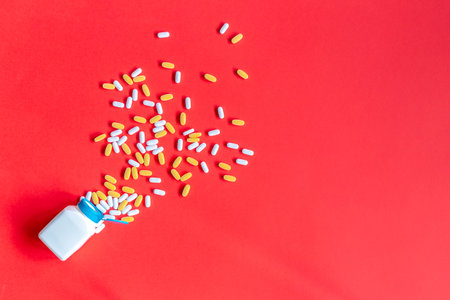 Medicine and pharmacy concept. Scattered pills. Top view with copy space.