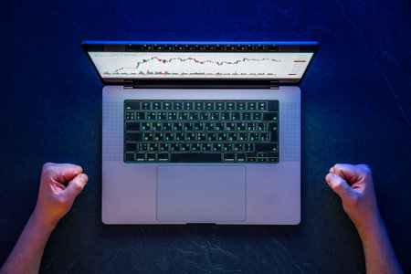 Hands on laptop. Trading. Crypto investment. Hands and laptop. Stock market.の写真素材