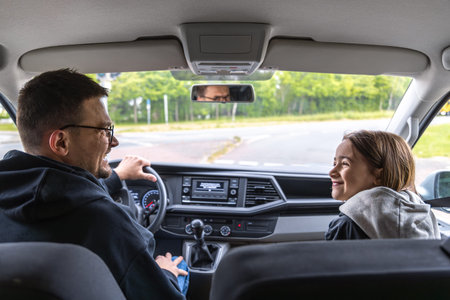 Smile at the wheel. Family trip. Morning on the road